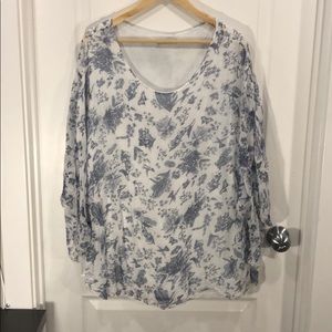 Flowy, white top with blue design